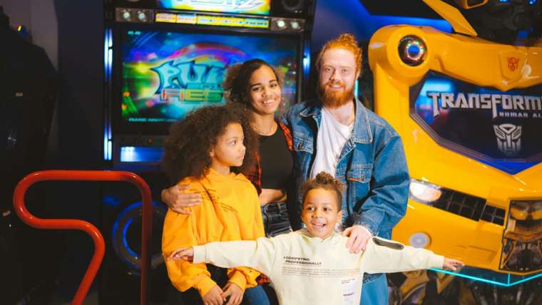 Family at PlixPlex Challenge Arcade in Virginia Beach